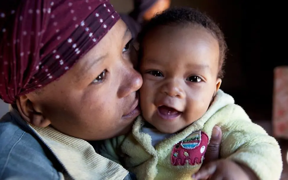 Dintle gets breast milk for six months. | United Internet for UNICEF We can reach an aids-free generation.