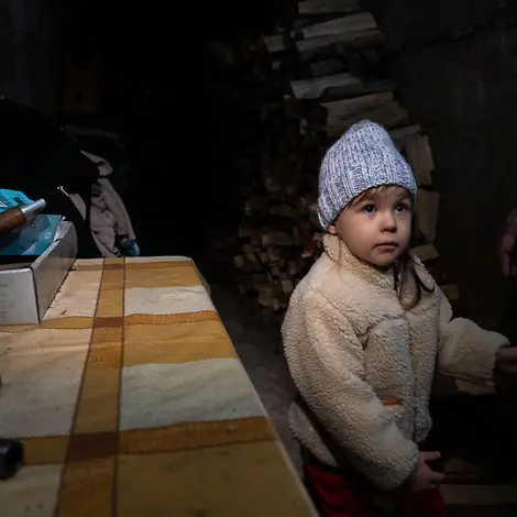 Families often seek shelter in cellars. © UNICEF/UN0827520/Filippov Families often seek shelter in cellars.